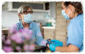 caregiving staff wearing a mask